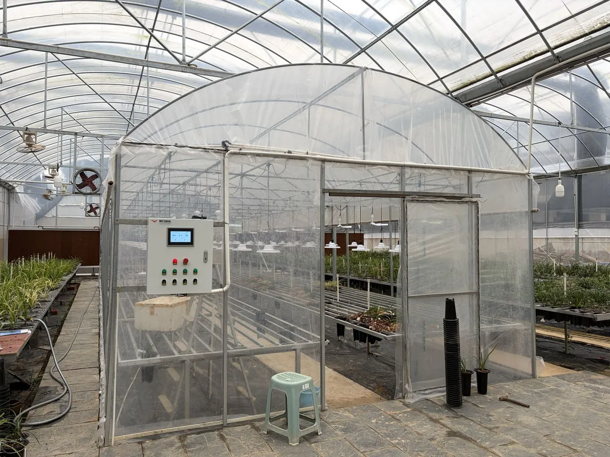 Orchid growing house with a YenGear control cabinet