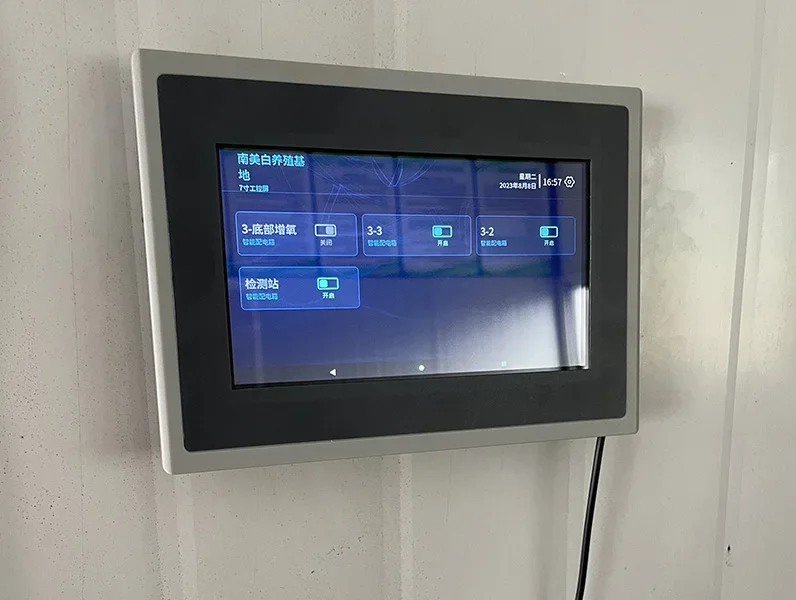 Industrial touch panel showing equipment control status